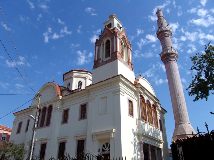 a white building with a tower on top