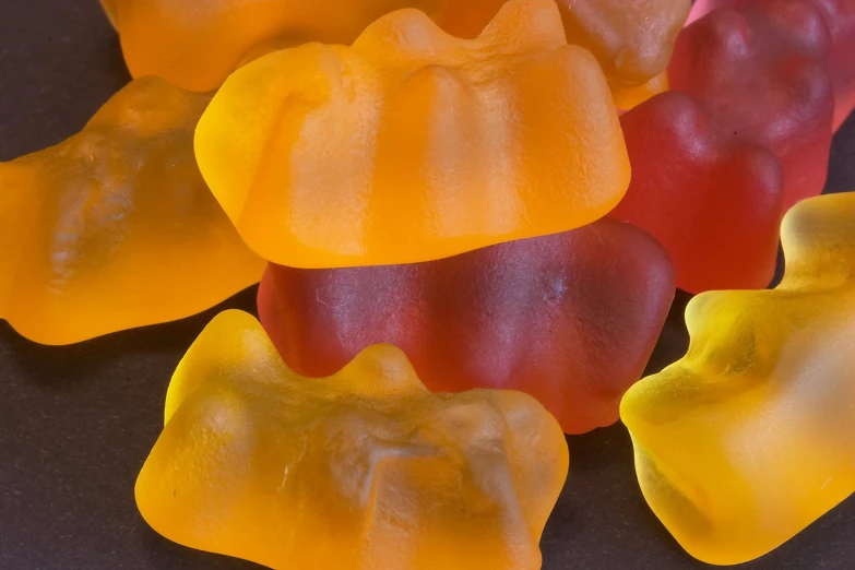 many gummy bears are sitting on a table