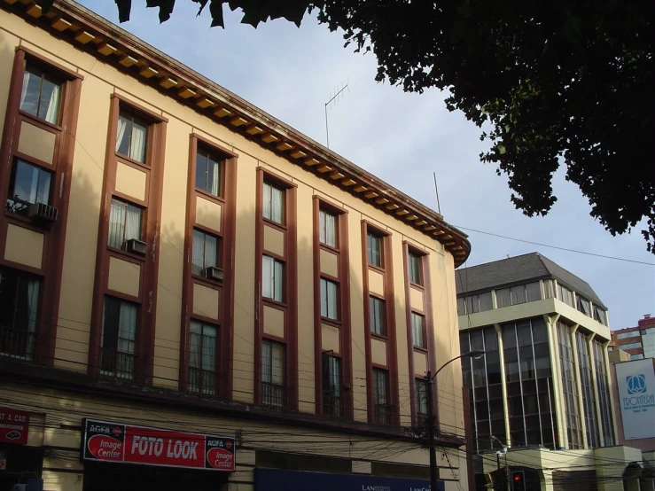 a building on the corner of a busy street