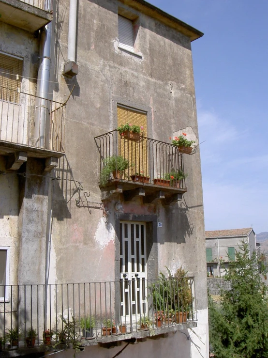 a building with two balconies attached to it