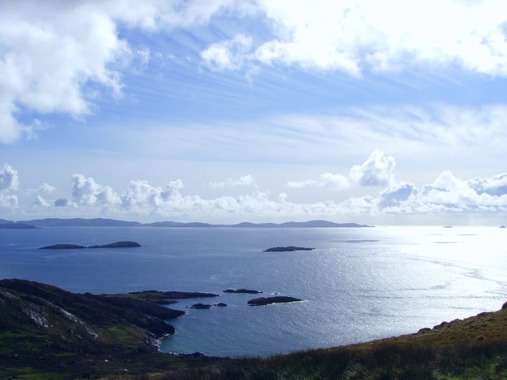 a couple of small islands are in the water