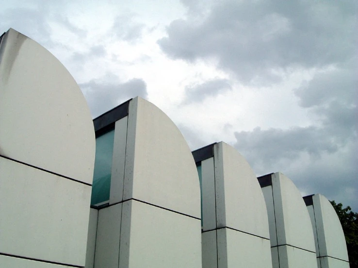 the modern looking facade of a building with a lot of windows