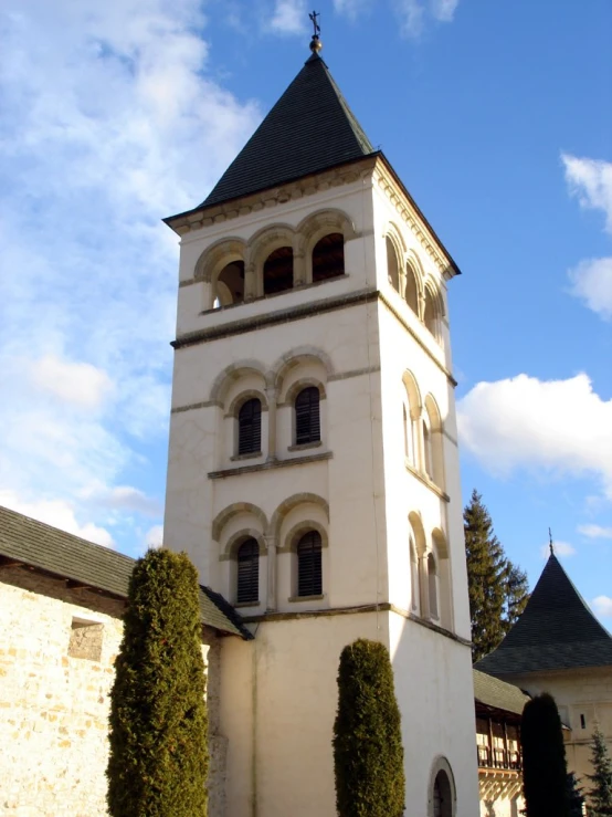 the tall building has many windows on top