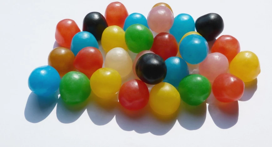 a group of candy balls are all mixed together