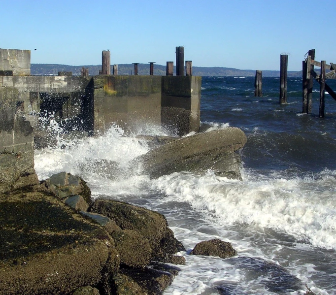 the tide has come to shore by the concrete docks