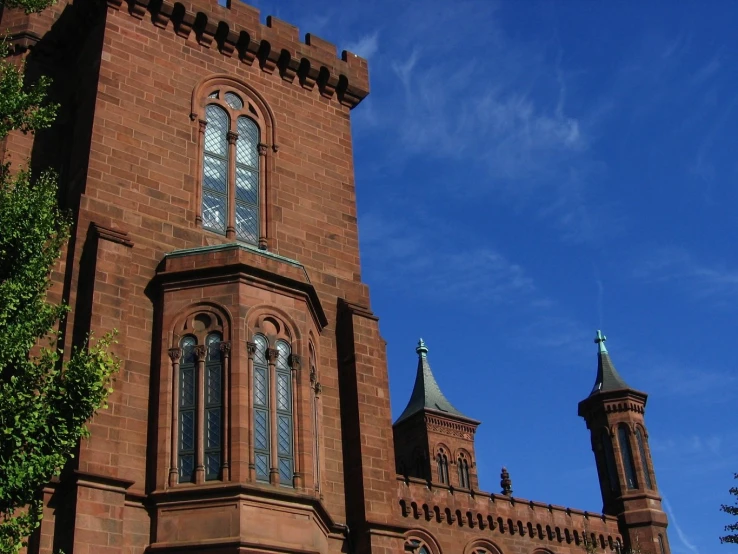 the outside view of an old building on a clear day