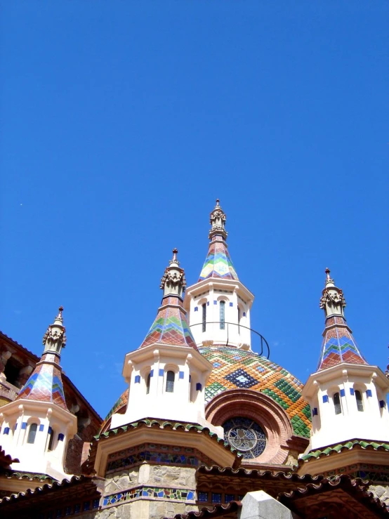 a building with three large, ornate top windows