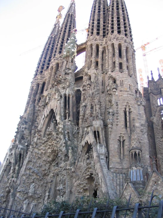 an elaborate architecture on a tall, stone building