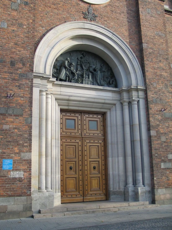 the old wooden door of a stone church