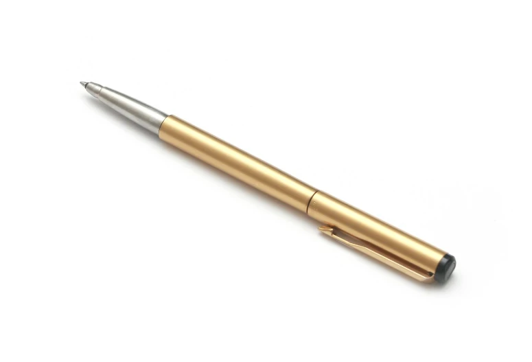 an image of a gold pen on a white background