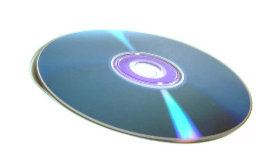 an empty cd disk that has been cut into pieces
