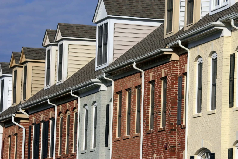 the row of older and newer houses