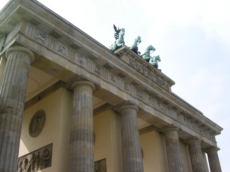 a building with sculptures on top of it