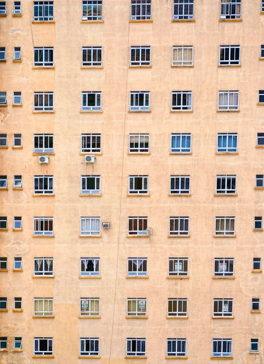 a very tall building with lots of windows on it