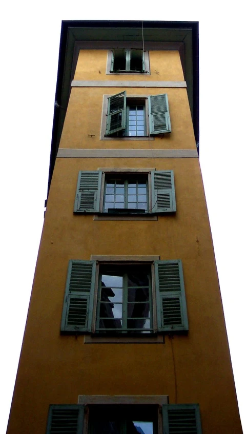 the building has windows with shutters opened