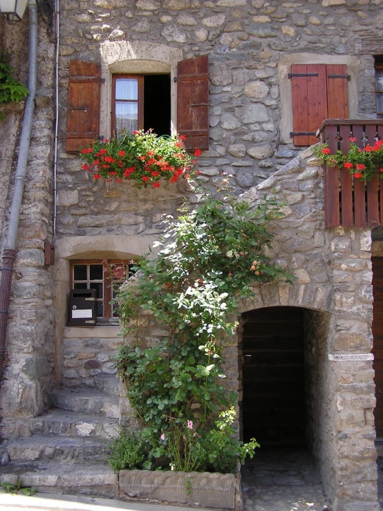 a street with a bunch of buildings that have different window boxes