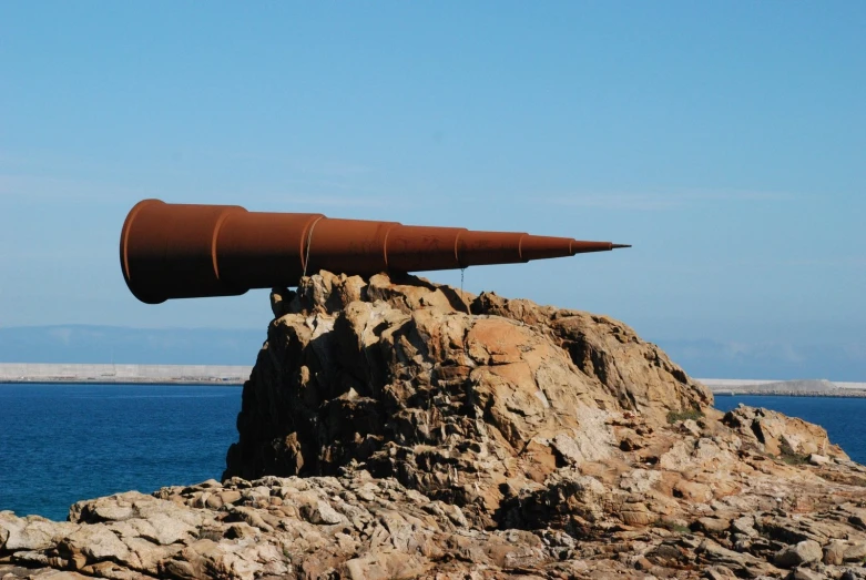 a large object resting on top of a rock