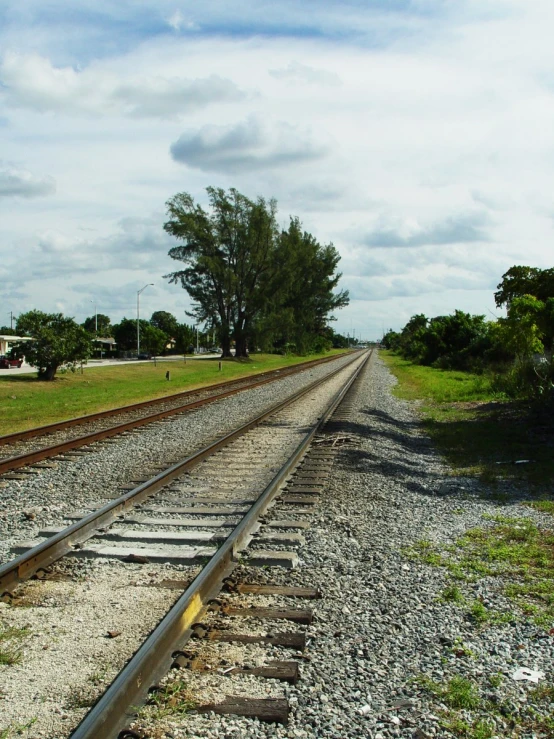 a set of railroad tracks running parallel with one other