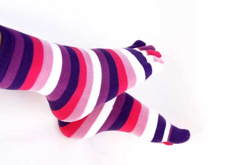 a pair of socks with red, blue and white stripes