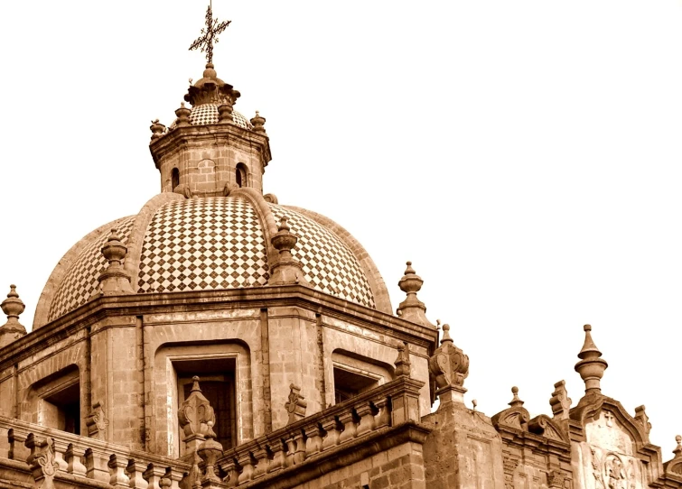 an old stone building with a cross on top