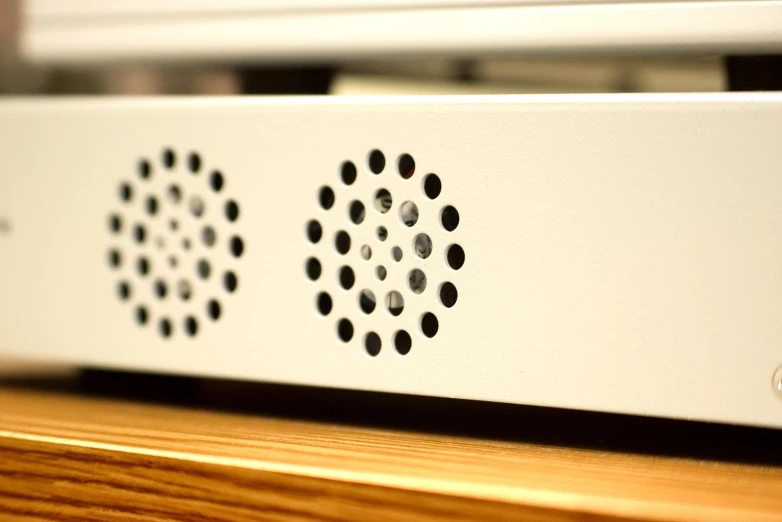 closeup view of the sound system on a wooden table