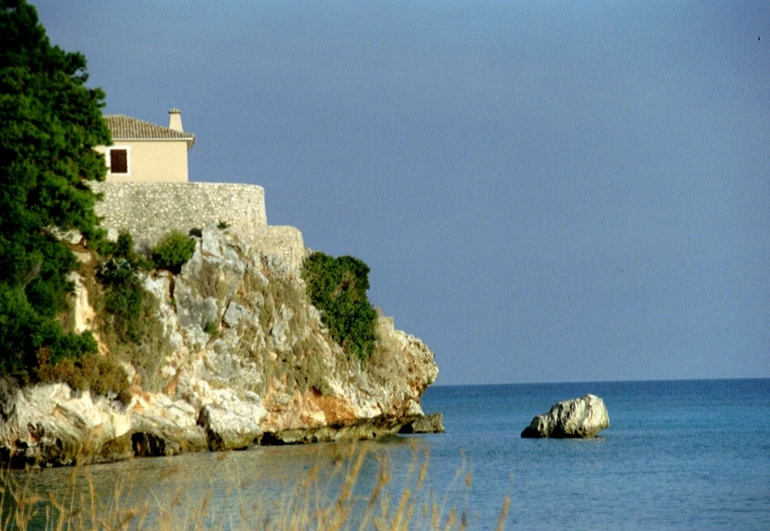 a building that is on top of some rocks