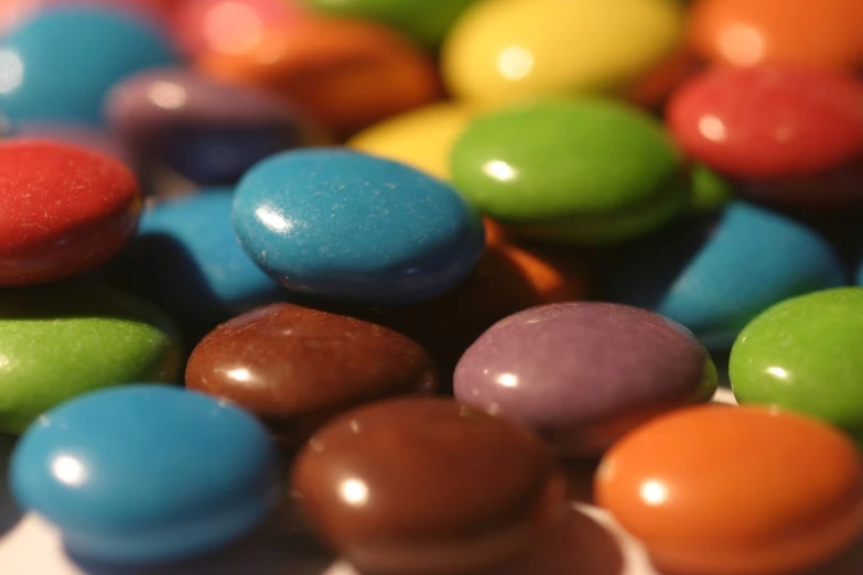 a close up s of some colorful chocolate candy beans