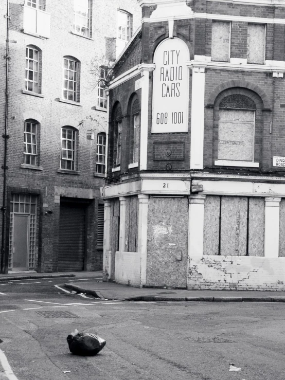 there is an old building in black and white