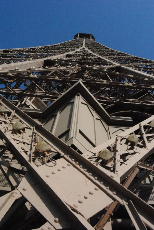 the top of the eiffel tower in paris looking up