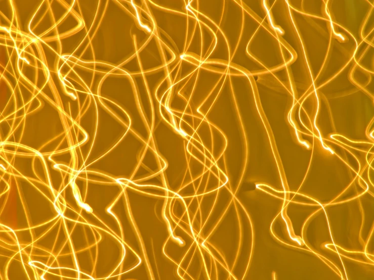 a yellow background with lots of light coming out of it