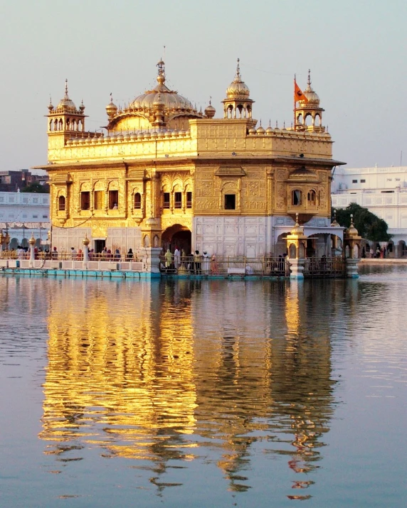 a body of water that is next to a large building