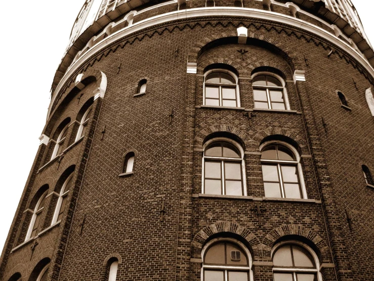 a clock tower on top of a brick building