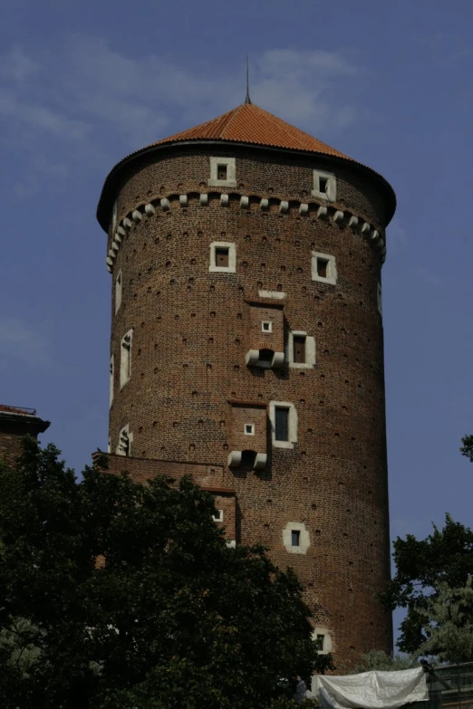 an image of a very tall tower with a clock