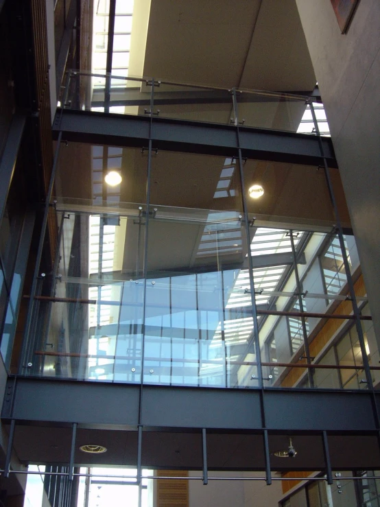 the inside view of a building looking down at the floor