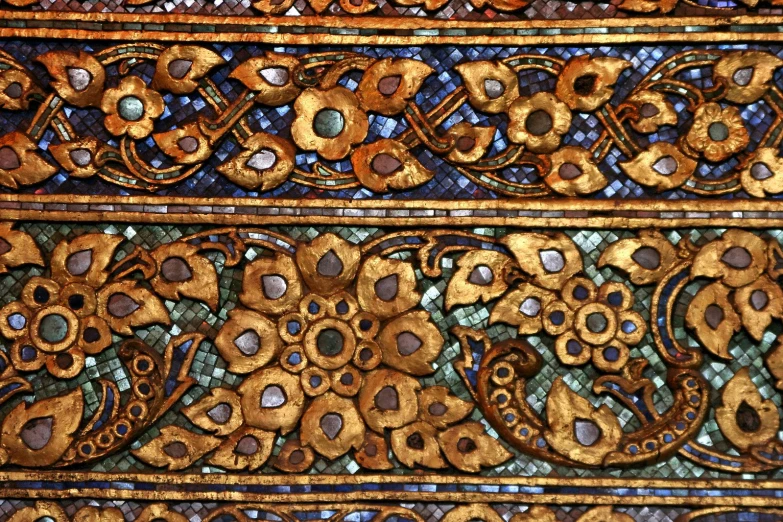 a wooden surface has decorative designs on it