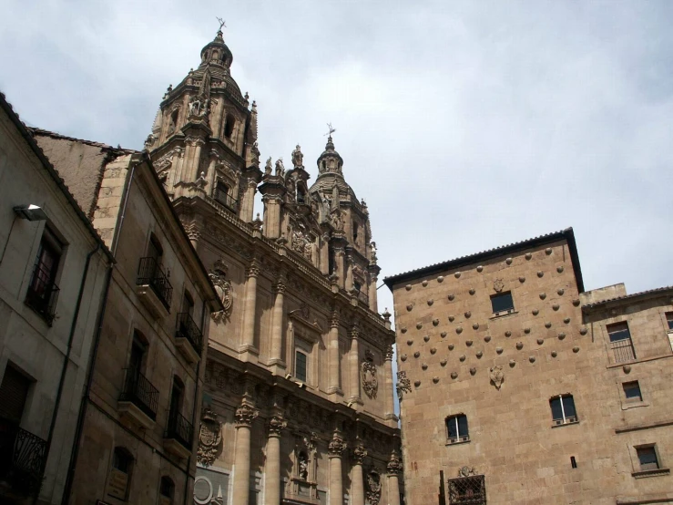 an old city with many large, brown buildings