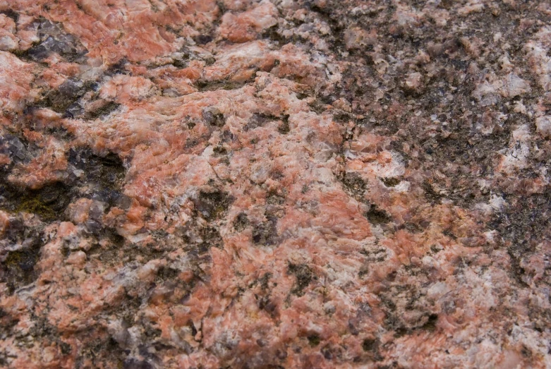 closeup view of pink, green and black marble