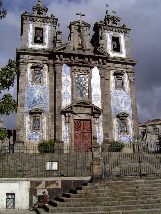 a tall, old church with intricate decor