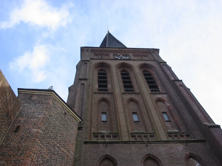 the back side of a church that is in the middle of a building