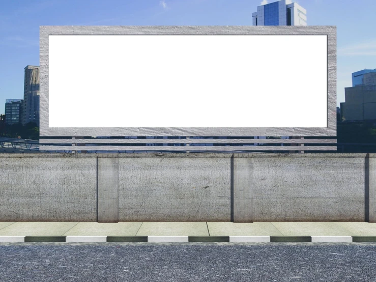 a large white billboard on the side of a road