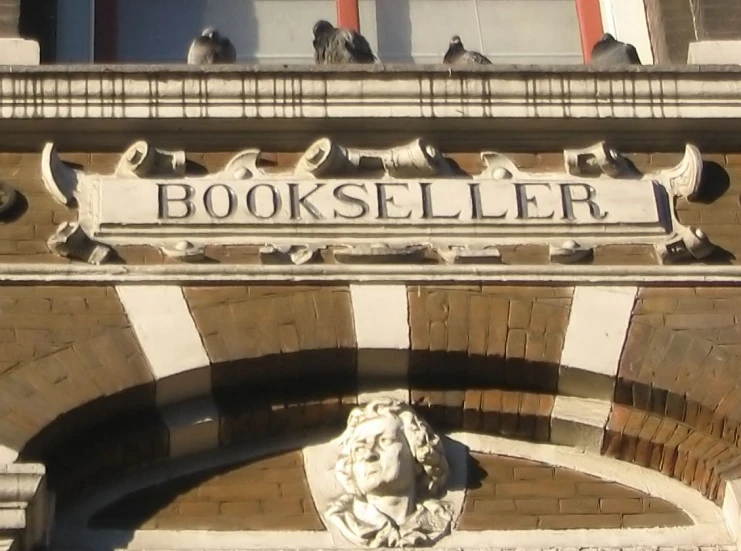 the sign above a doorway reads bookstore