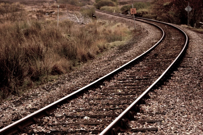 a long train track in the middle of a country