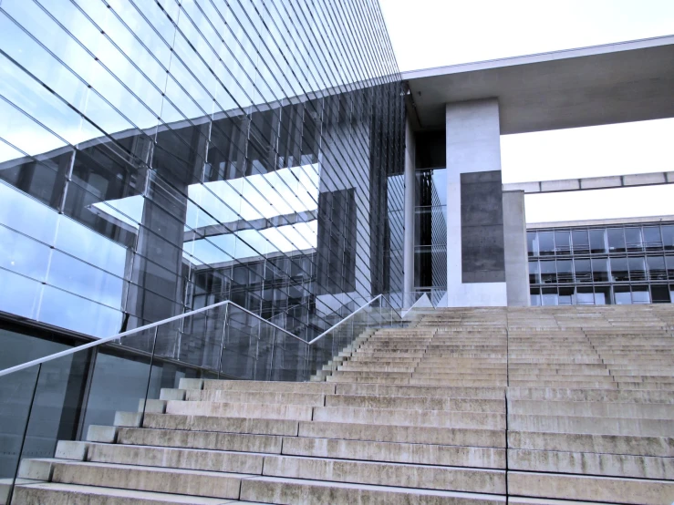 the stairs leading to a very high building