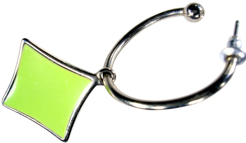 a green and black ear piece is hanging from a hook