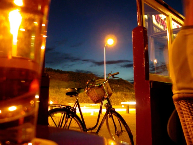 a bicycle is parked on a side walk