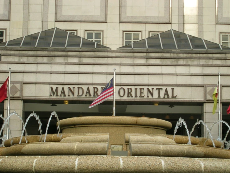 a building with fountains in front of it