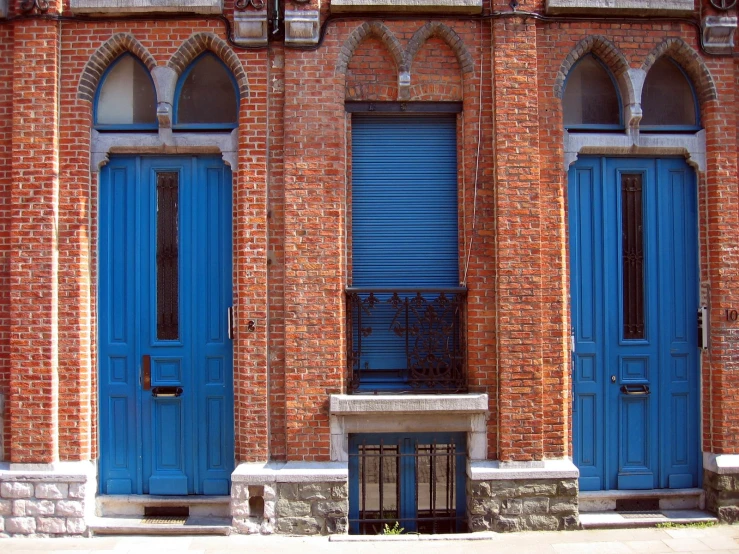 two doors are open on this old building