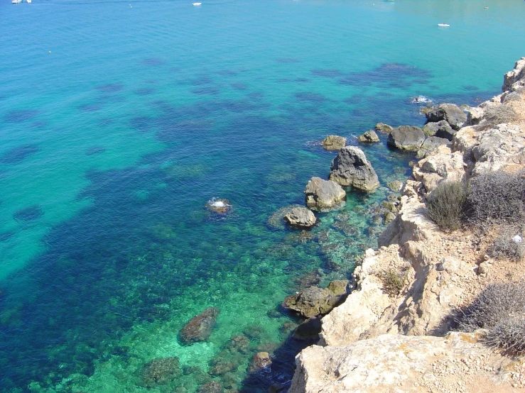 a view of some very pretty blue water