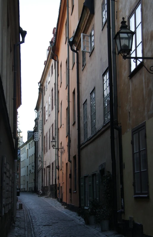 the old city street is lined with cobblestones
