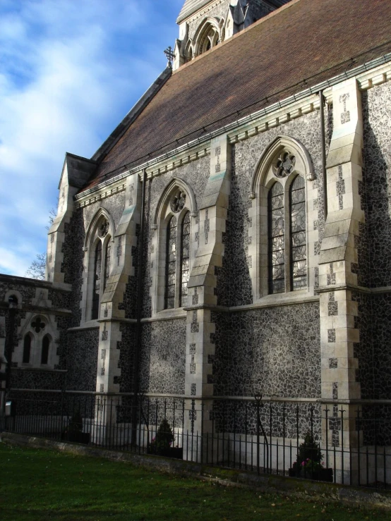 the top of a large church building with many windows